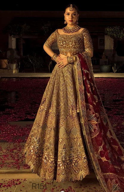Woman in an ornate traditional outfit with a dark background