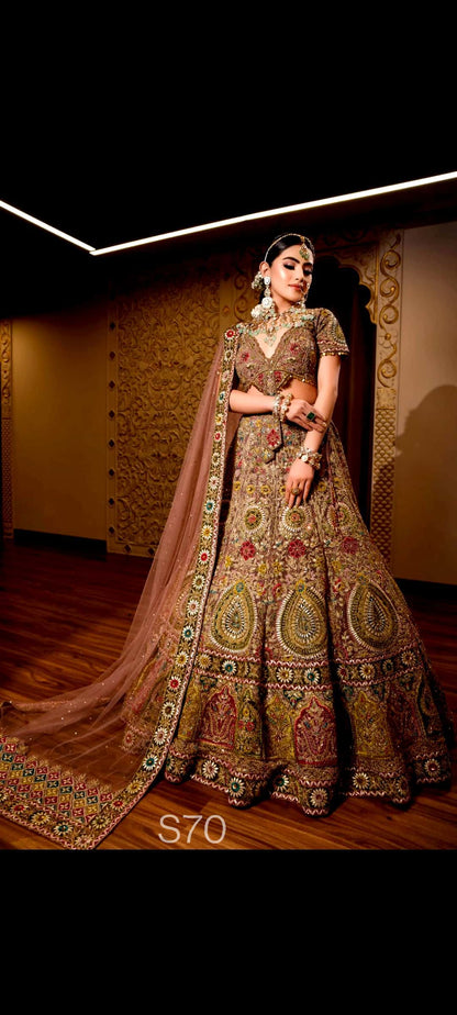 Traditional embroidered Wedding Lehenga lehenga with a matching dupatta on a wooden floor.