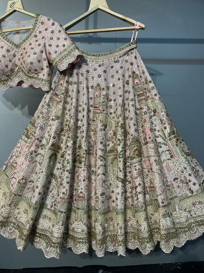 Traditional embroidered skirt and top on hangers against a gray background